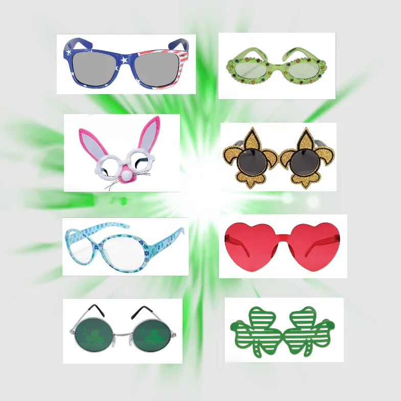 Colorful novelty glasses on green background.